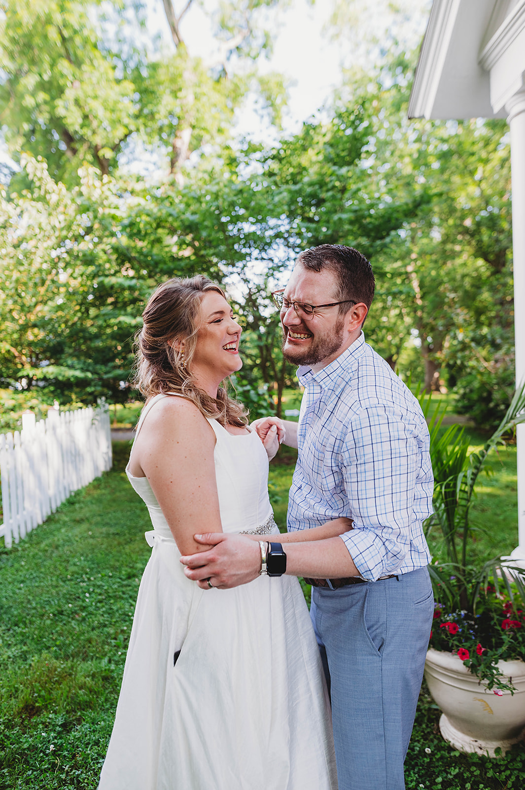 Newly married wedding portraits in stunning outdoor garden