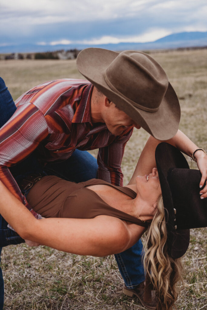 A romantic dip during outdoor swing dancing in Montana