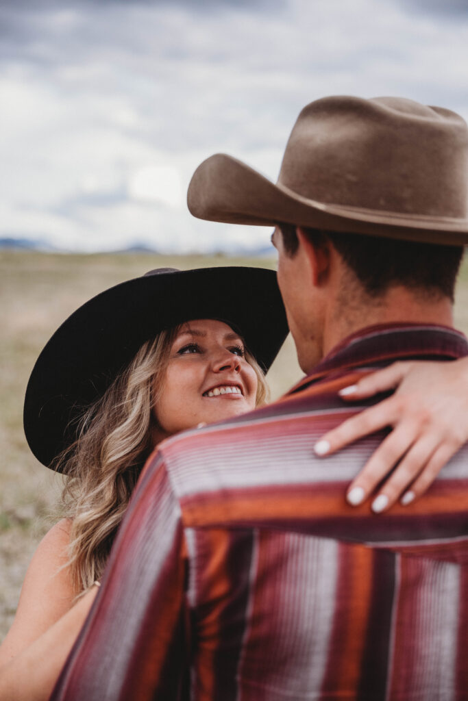 romantic couples session in Montana with couple gazing lovingly at each other