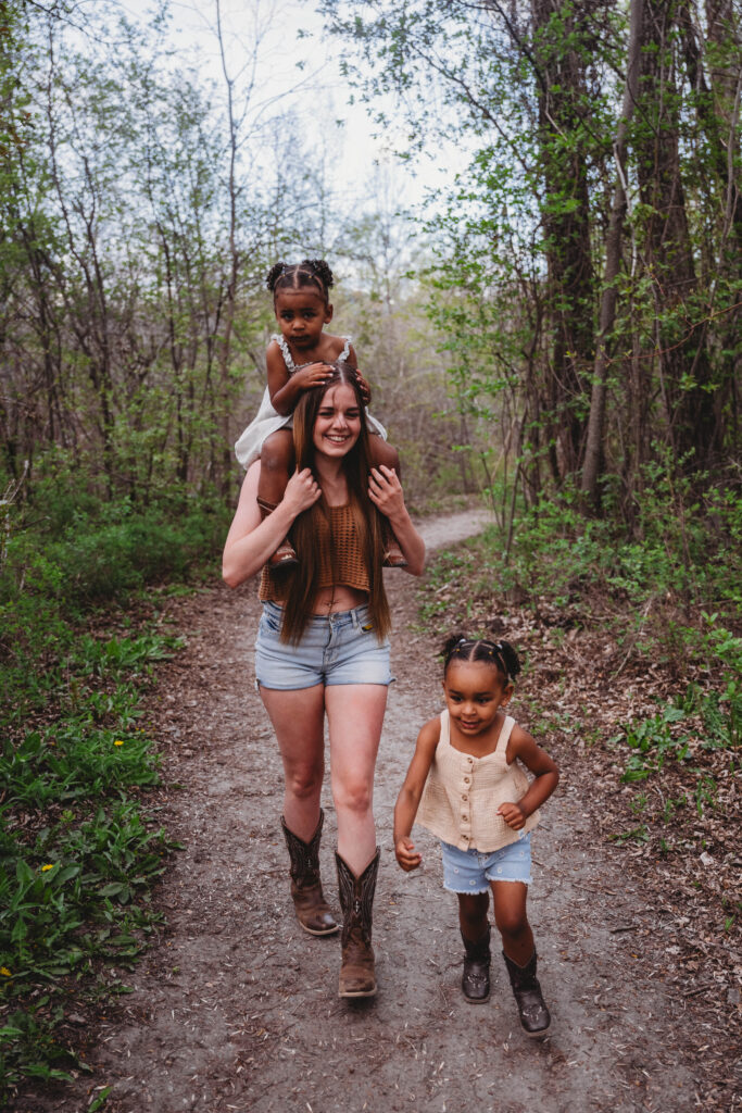 piggyback rides and little kids running through the woods with mom