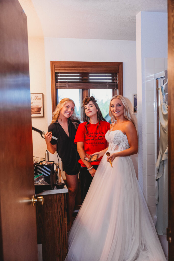 bride and bridesmaids getting ready for the festivities