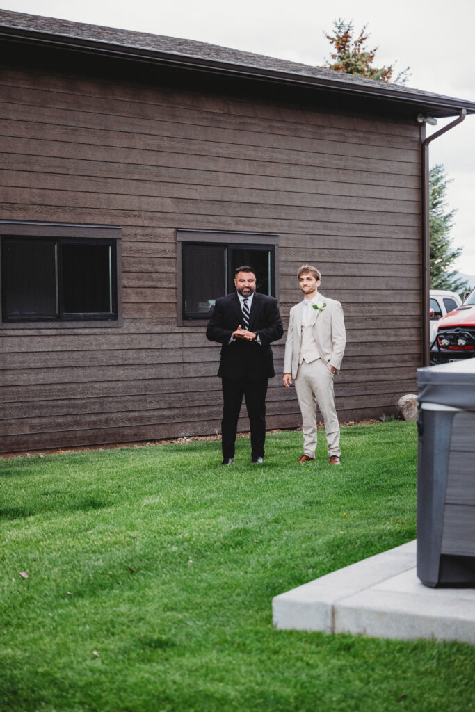 officiant and groom waiting for ceremony to start