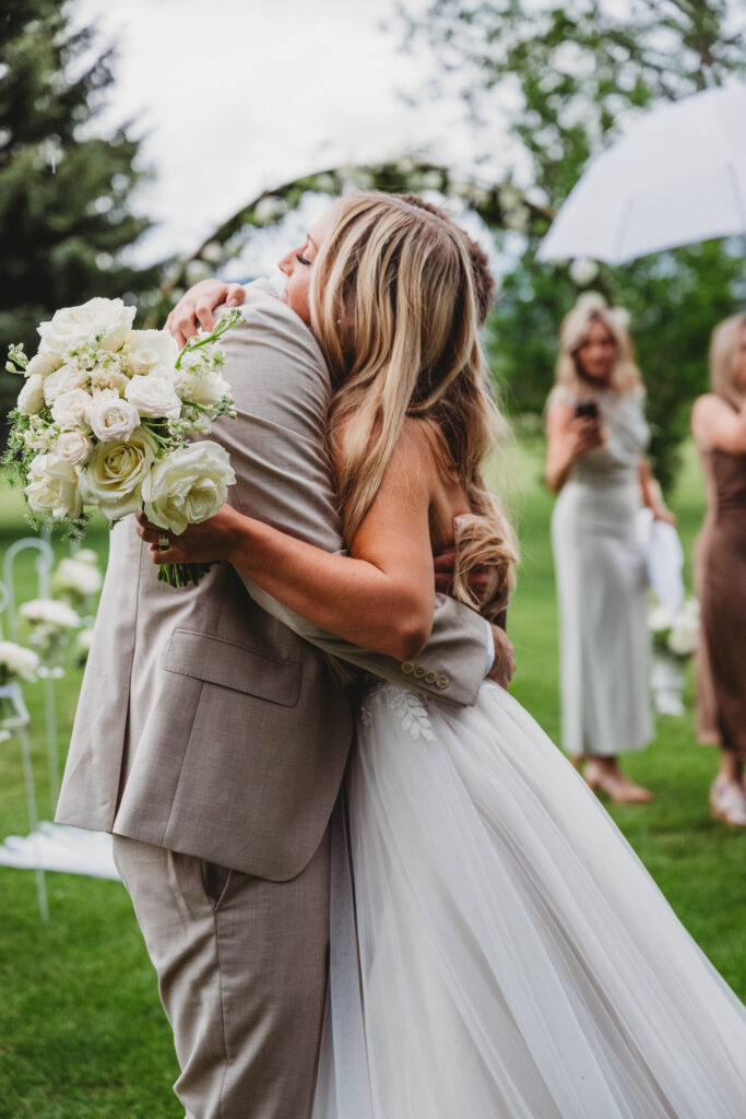hugs for the newlyweds. they are married!